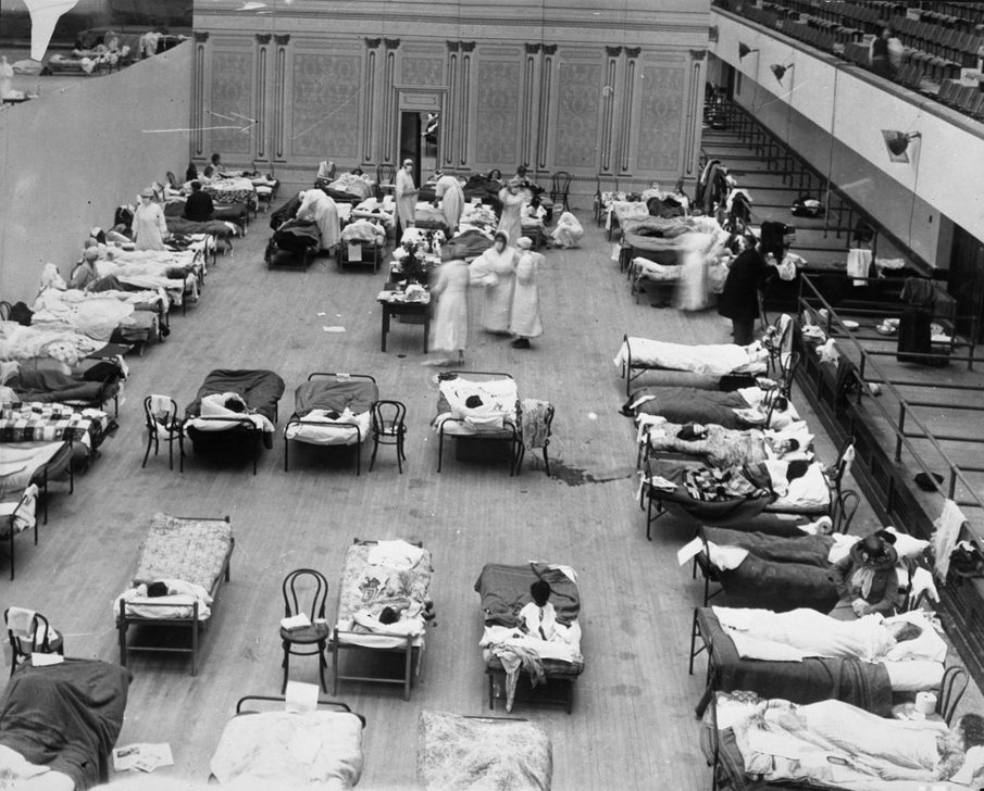 Patients suffering from the Spanish flu in a makeshift hospital, 1918